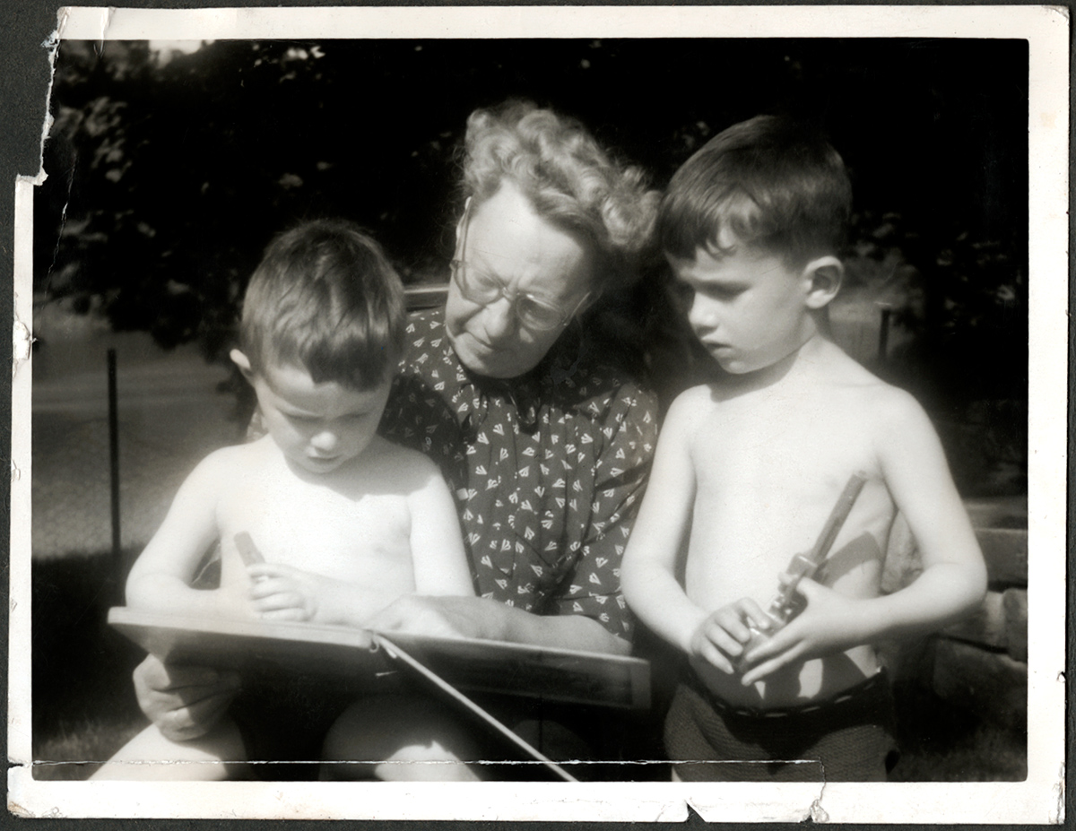 My Belgian grandmother, Jeanne Wauters, in Bolton in 1952, the only time she came to England, reading to my brother Anthony and me